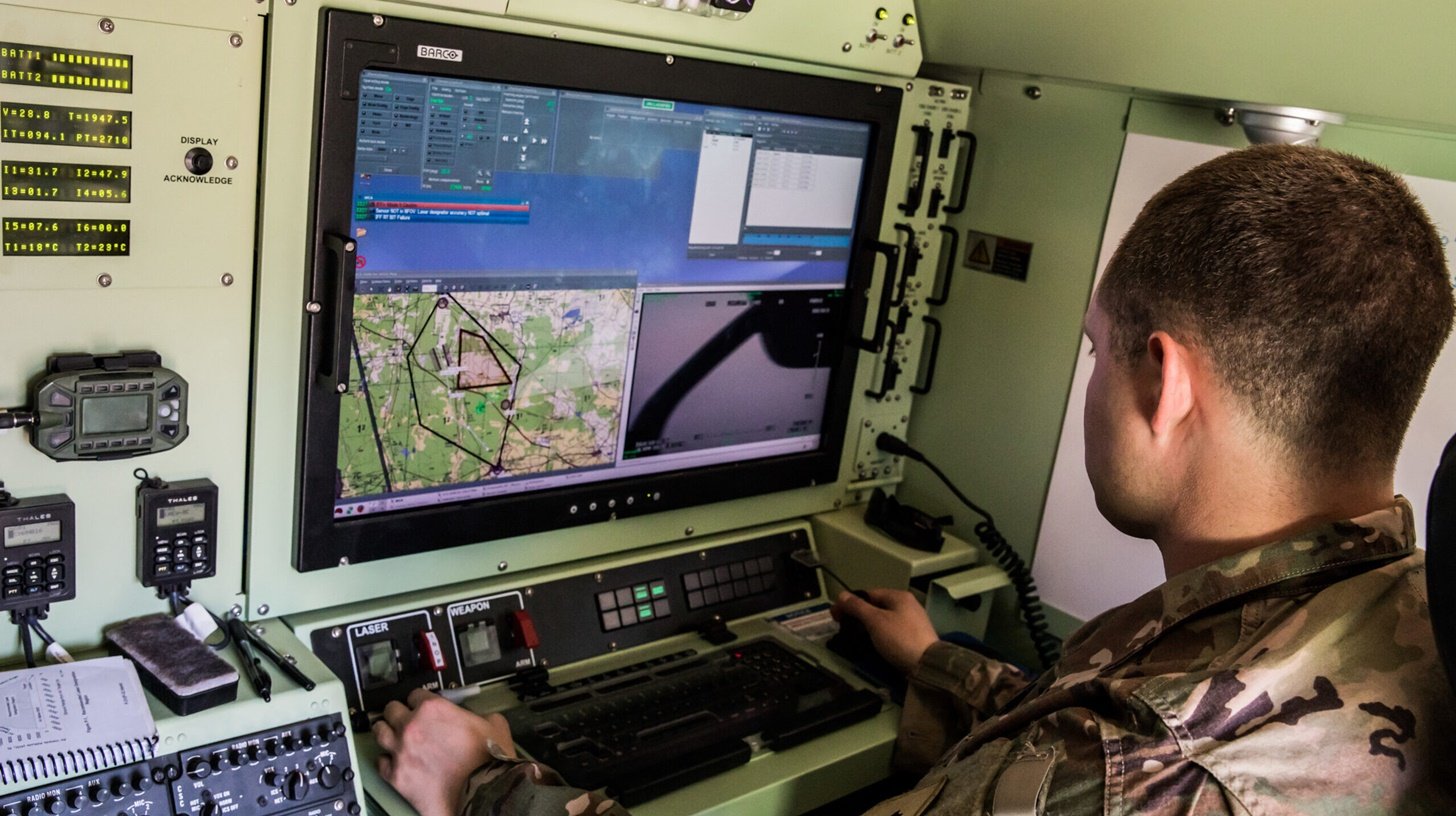 Spc. William Pruitt, an Unmanned Aerial Vehicle Operator with the 1st Engineer Battalion, 1st Armored Brigade Combat Team, 1st Infantry Division operates an RQ-7 Shadow Unmanned Aerial Vehicle during a surveillance training mission on an airfield at Camp Trzebien, Poland April 5, 2019. The Soldiers of Delta Company, 1st Eng. Bat. regularly train on the Shadow, ensuring that they can respond rapidly to real-world surveillance missions. (U.S. Army Photo by Sgt. Jeremiah Woods)